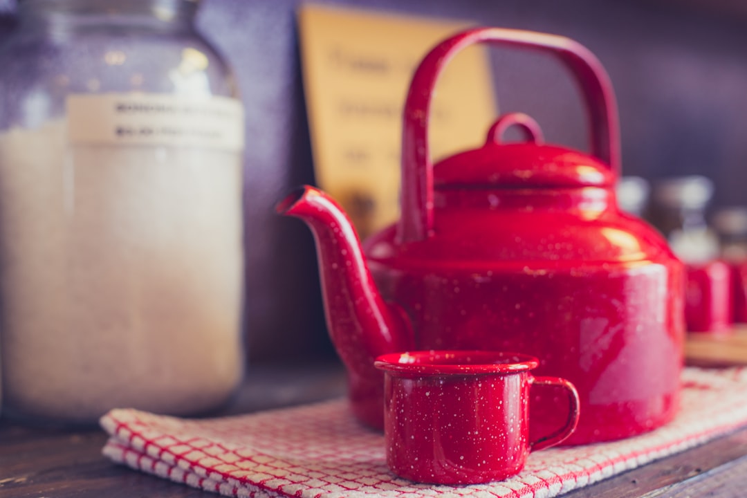 Jasmine green tea recipe homemade blend ingredients being mixed in wooden bowl