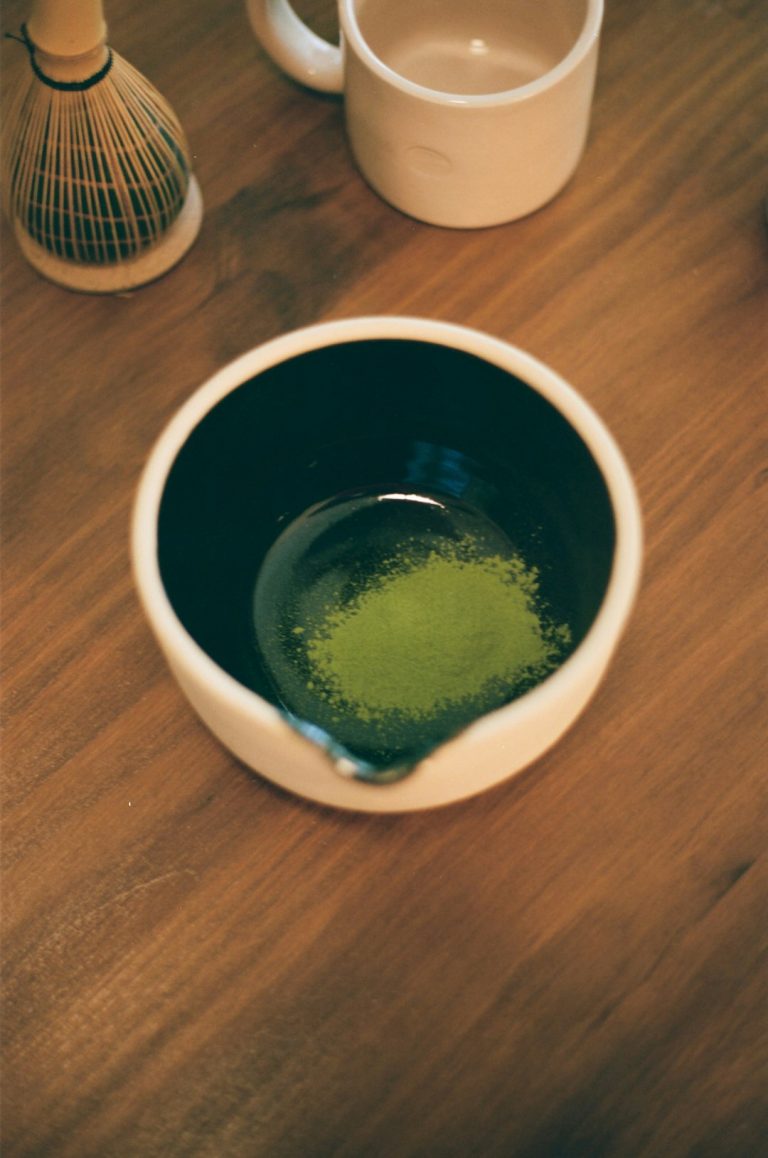Matcha tea cure adhd concentration naturally with traditional preparation method showing whisked green powder