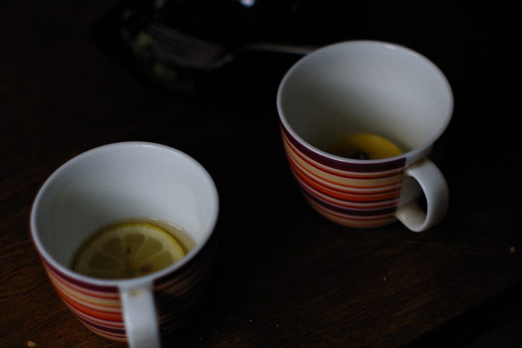 Ceremonial grade matcha powder and prepared tea showing natural UTI treatment with matcha tea cure urinary tract infections