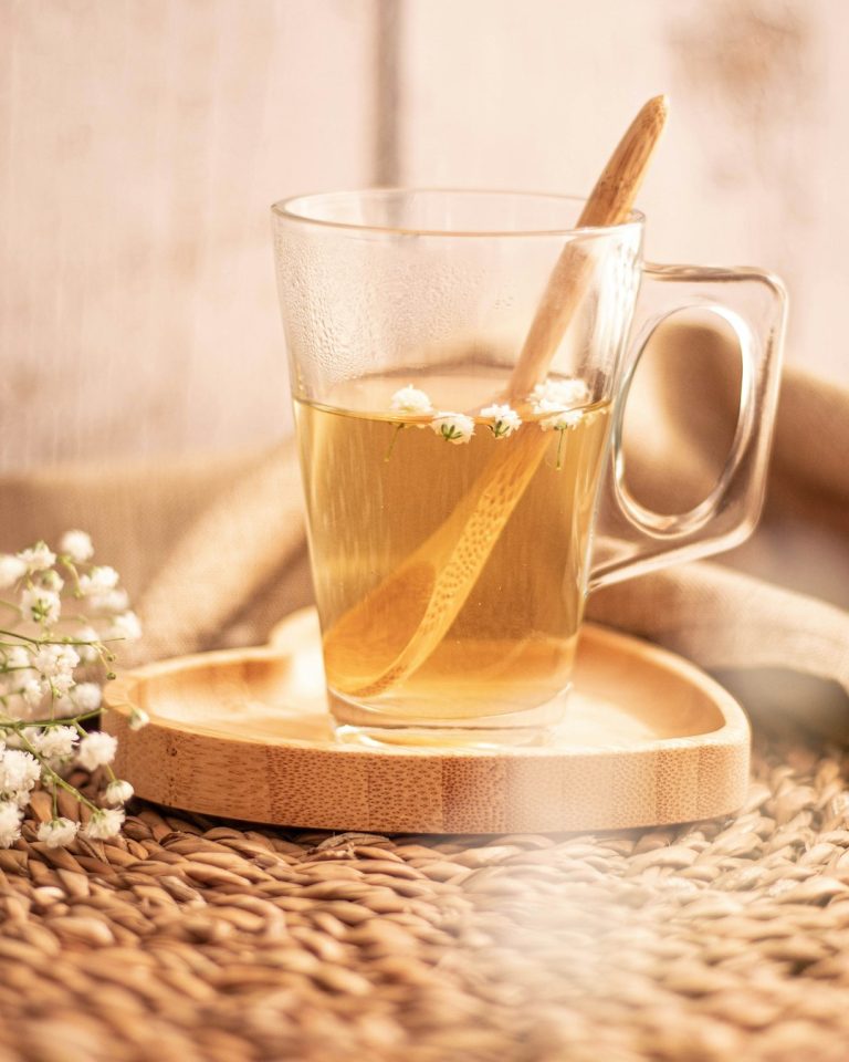 Cold brew matcha tea recipe smooth preparation steps showing sifting and whisking process